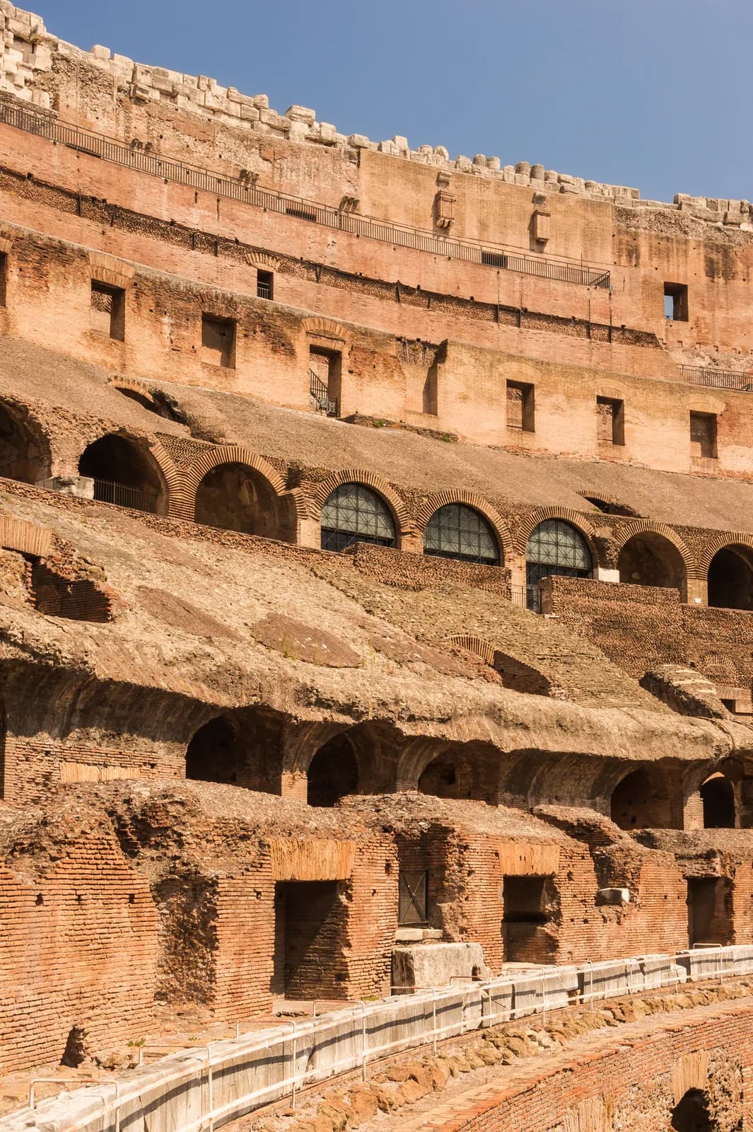 The Colosseum in Rome — exterior curve seen in vertical perspective from below.