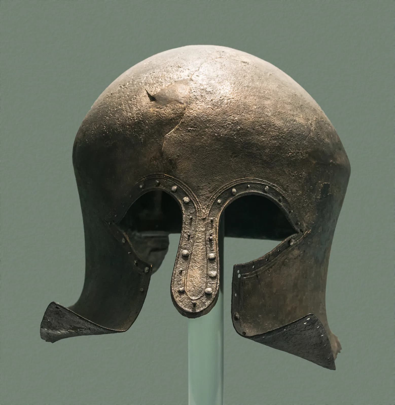 Bronze Corinthian-type helmet of the Archaic Greek period, with full face and nasal, ca. 600 BCE, National Archaeological Museum of Athens.