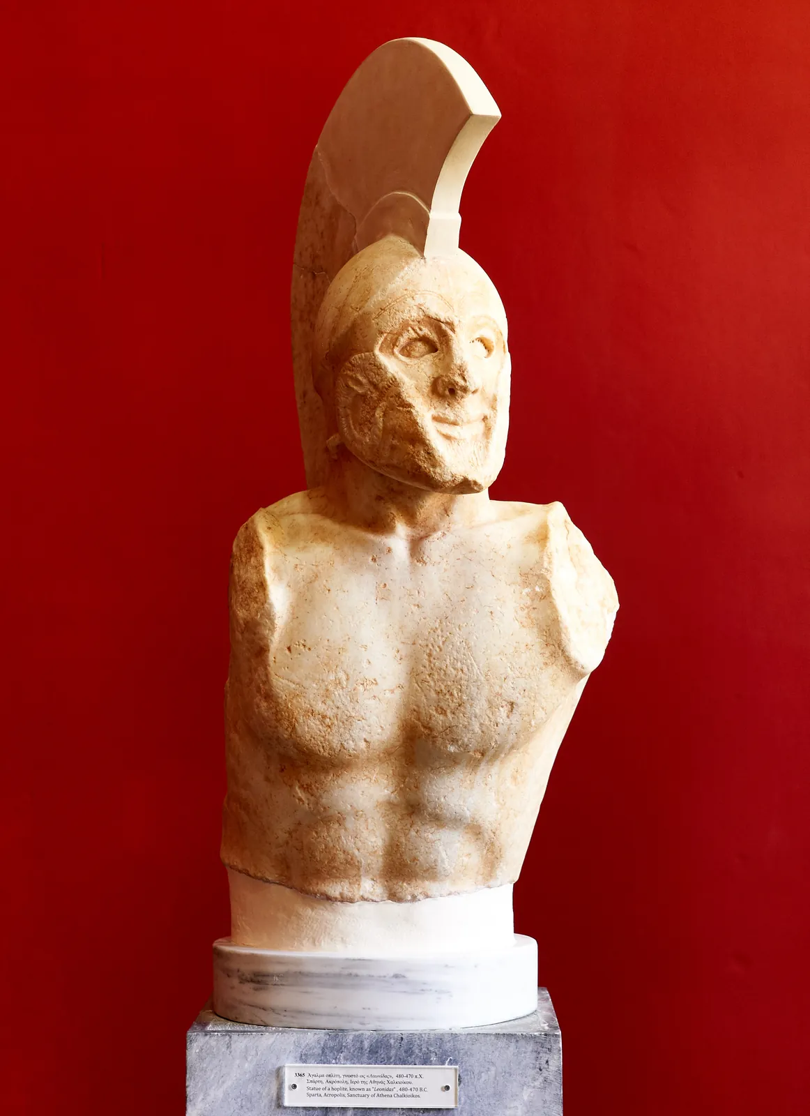 The marble torso of an early-Classical Spartan warrior, helmeted with a crested Corinthian helmet, found on the Spartan acropolis and traditionally called 'Leonidas.'
